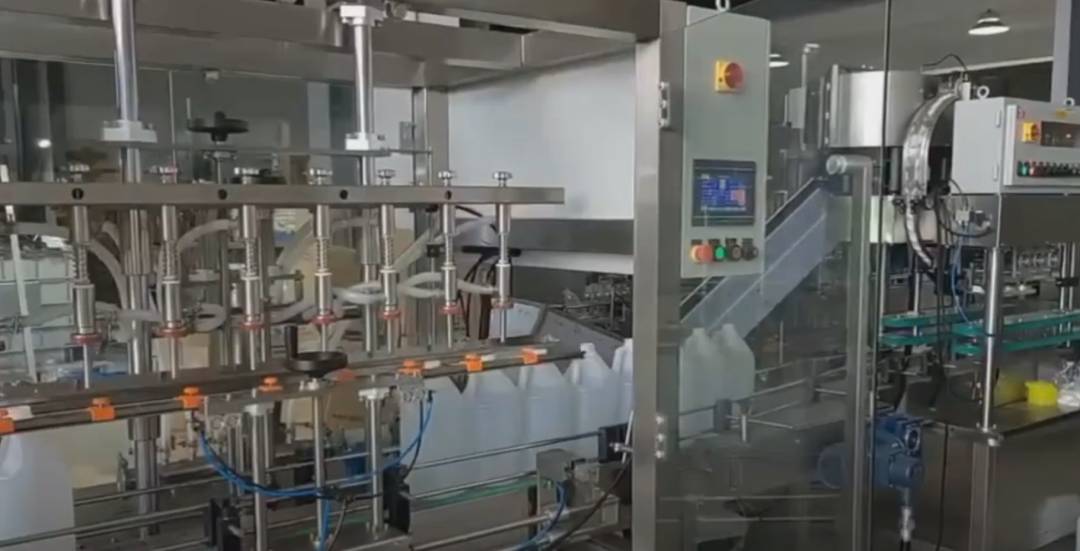 Automated hazardous chemical bottling and packaging system in operation